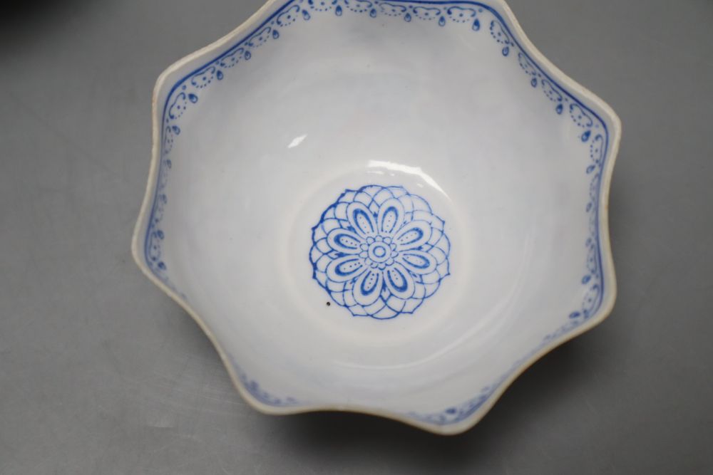 A pair of Chinese famille rose bowls and covers, late 19th century, a blue and white box and cover, 11cm and an eggshell bowl, 8cm